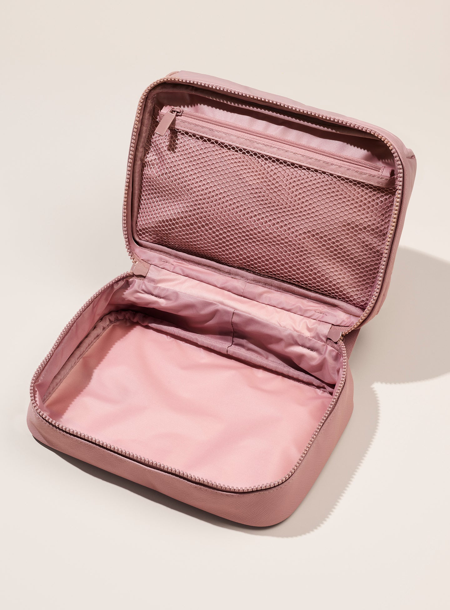 pdp-puffy-toiletry-bag-mauve-top-open-1